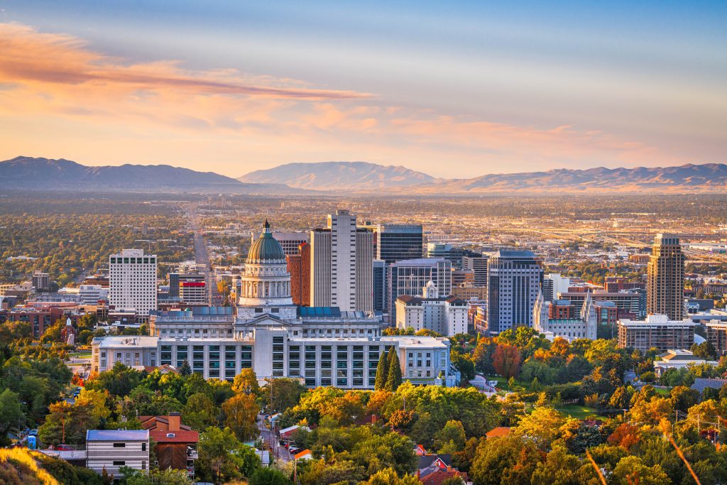 Aerial view of the Salt Lake City skyline at sunset, representing digital marketing agencies in Utah supporting local and statewide business growth.